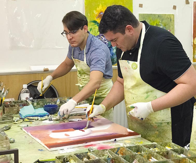 ASSISTED by his partner Tarcisio Sampaio, an entranced Florencio Anton is seen producing automatic art.